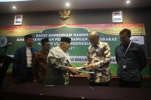  AXA Mandiri dan MUI Lanjutkan Kerja Sama Literasi Asuransi Syariah