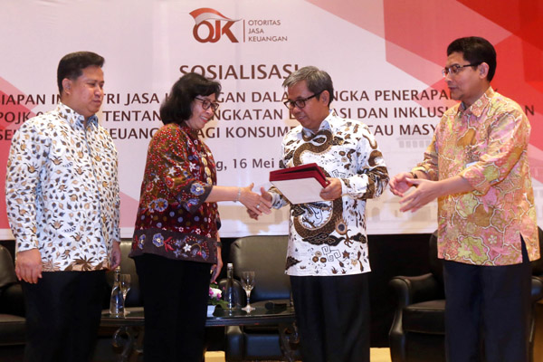  FOTO: OJK Pacu Sosialisasi Literasi dan Inklusi Keuangan