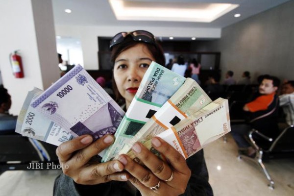  PERSIAPAN UANG LEBARAN : Bank Tambah Pasokan