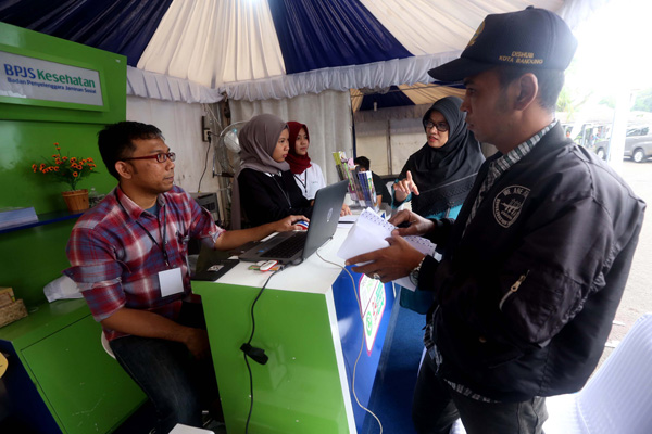  FOTO: BPJS Kesehatan Defisit, Pemerintah Pusat dan Daerah Gotong Royong Penuhi Anggaran