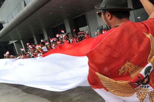  21.000 TKI Merah Putihkan Hong Kong Convention and Exhibition Center