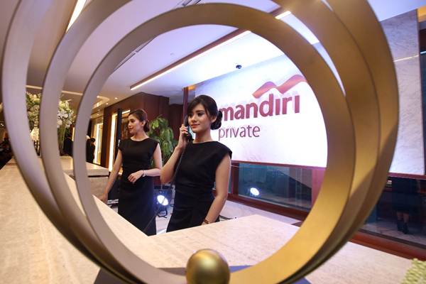 TRANSAKSI VALUTA ASING : Bank Mandiri Tingkatkan Pangsa Pasar