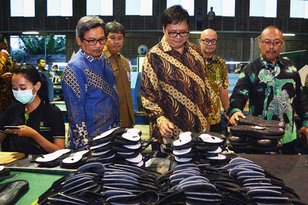  INDUSTRI ALAS KAKI : Impor Bahan Baku Masih Tinggi