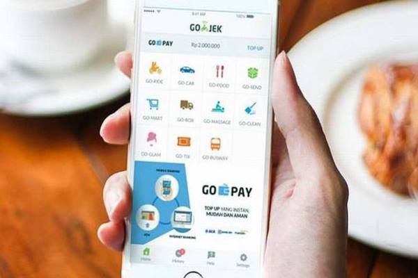  SOLUSI PEMBAYARAN : Go-Jek Kebut Go-Pay Tahun Depan