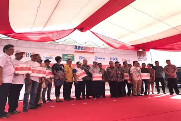  Alfamart Bersama 7 Bank Berdayakan Warung Tradisional