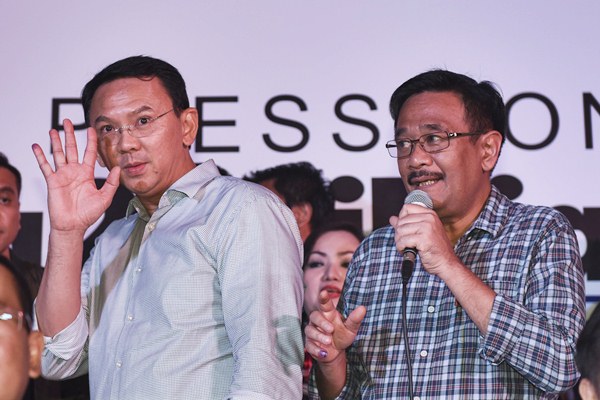 Basuki Tjahaja Purnama atau Ahok (kiri) dan Djarot Saiful Hidayat di Jakarta, Rabu (19/4)./Antara-Hafidz Mubarak A