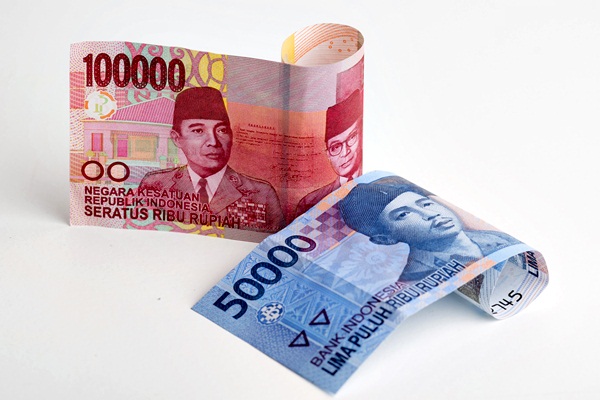 Uang rupiah./Bloomberg-Brent Lewin