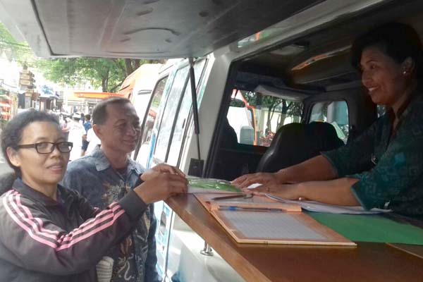  Dorong Taat Pajak, Denpasar Bagi-bagi Kaos Gratis