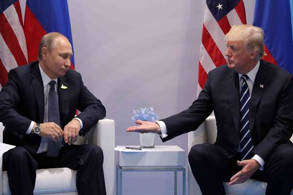  Putin Ajak Trump Bahas Perang Siber, Peluru Kendali Hingga Terorisme