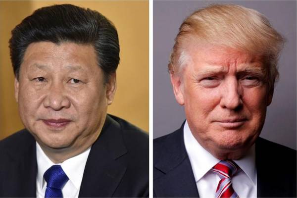 Presiden China Xi Jinping (kiri) dan Presiden AS Donald Trump./Reuters-Toby Melville