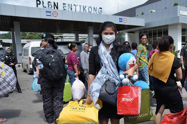 Wajah Pekerja Migran Indonesia yang Dideportasi Malaysia