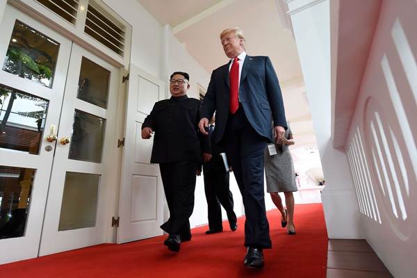  KTT AS-Korut: Begini Kata Pakar Makna Bahasa Tubuh Trump & Kim Jong-un 