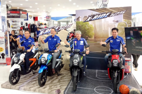 Jajaran manajemen PT Yamaha Indonesia Motor Manufacturing (YIMM) memperkenalkan skutik All New X-Ride 125 di Kemayoran, Jakarta, Sabtu (30/6/18). -ANTARA 