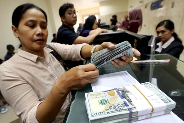  Rupiah Melemah, Likuiditas Valas Kian Ketat