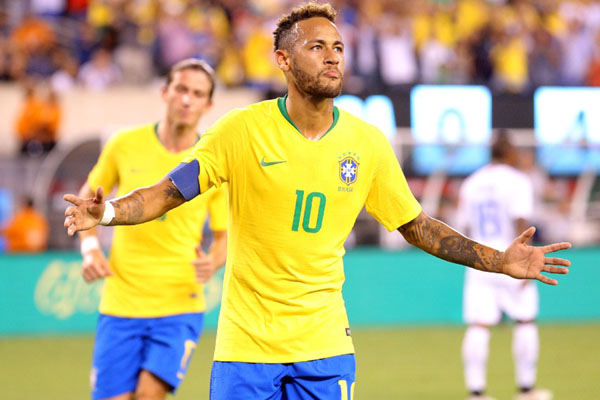 Penyerang Timnas Brasil Neymar da Silva Santos Jr. selepas menjebol gawang AS dari titik penalti./Reuters