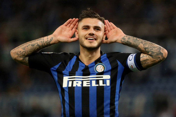 Striker Inter Milan Mauro Icardi setelah mencetak gol ketiga timnya ke gawang Lazio./Reuters-Tony Gentile