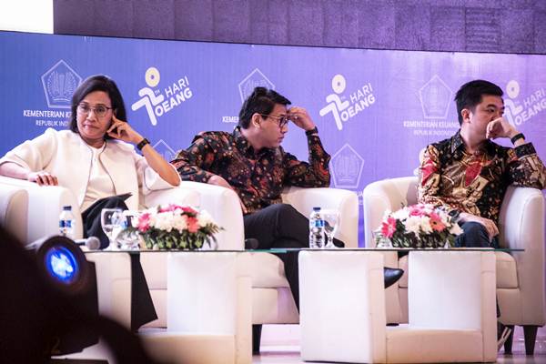  Sri Mulyani Hadiri Seminar Peringatan Hari Oeang