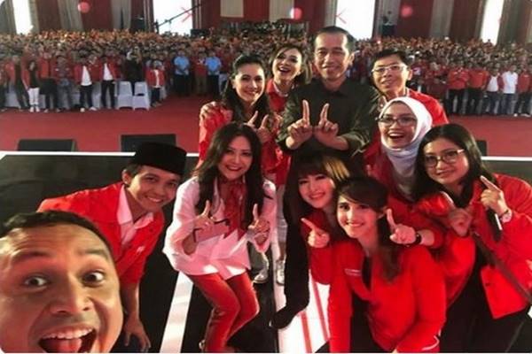 Presiden Joko Widodo menghadiri ulang tahun keempat Partai Solidaritas Indonesia (PSI) di ICE ICE BSD, Minggu (11/11)./Twitter PSI