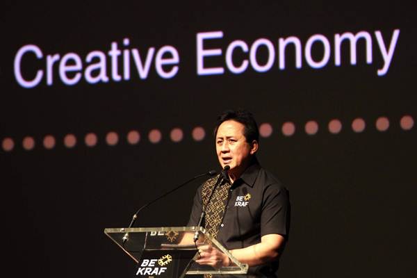 Kepala Badan Ekonomi Kreatif (Bekraf) Triawan Munaf memberikan sambutan pada Outlook Conference 2019 di Jakarta, Rabu (17/10/2018)./JIBI-Dwi Prasetya