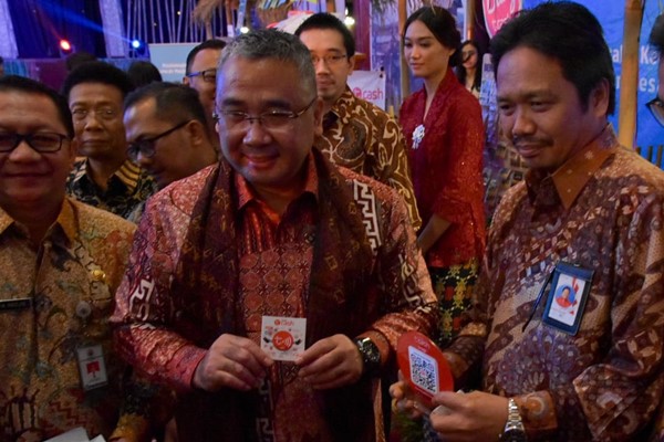  TCash Cairkan Kredit Mikro dengan Ponsel Jadul