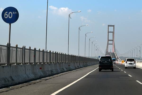  Kenapa Melintasi Jembatan Suramadu Tak Bayar Tol, Ini Penjelasannya