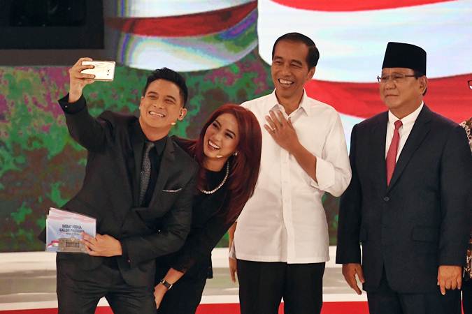  KPU Pastikan Jokowi & Prabowo Tidak Gunakan Alat Bantu Earpiece Saat Debat