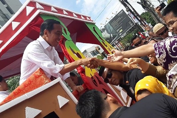  Jokowi Ajak Tak Golput dan Puji Kota Palembang