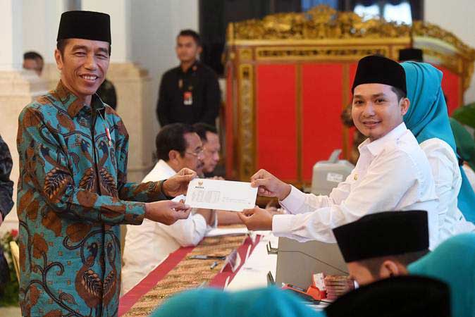  Pemilu Berlangsung Aman, Presiden Jokowi Puji Kerja Keras TNI/Polri