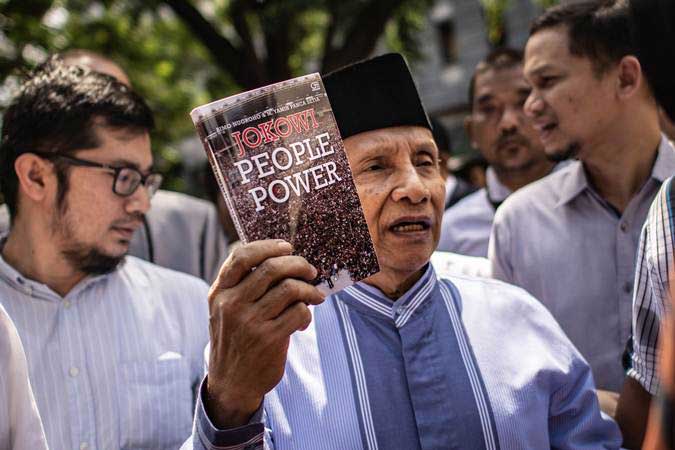  Amien Rais Bawa Buku \"Jokowi People Power\" ke Ditreskrimum Polda Metro Jaya