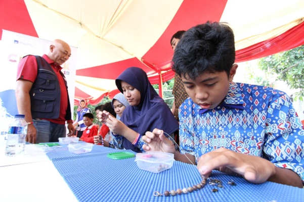  Dukung Program Literasi Keuangan OJK, Axa Mandiri Sasar Anak Penyandang Autisme