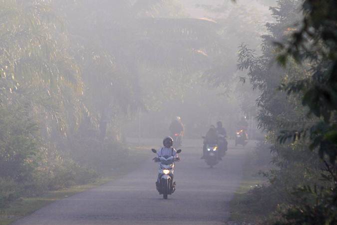  Aktivitas Warga Aceh Barat Kembali Terganggu Kabut Asap