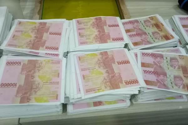 Uang palsu pecahan Rp100.000 edisi baru./Bisnis-Juli Etha