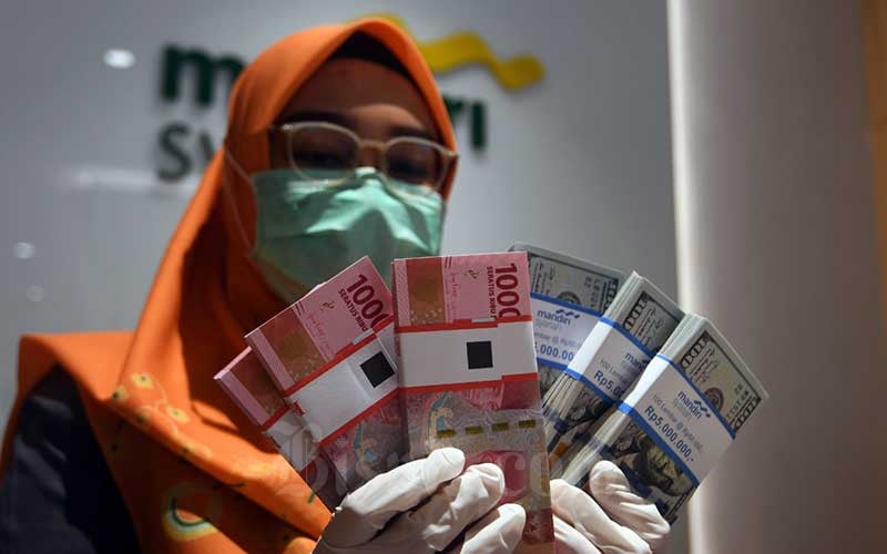  Kurs Jisdor Melemah ke Rp15.591, Rupiah Melemah di Pasar Spot