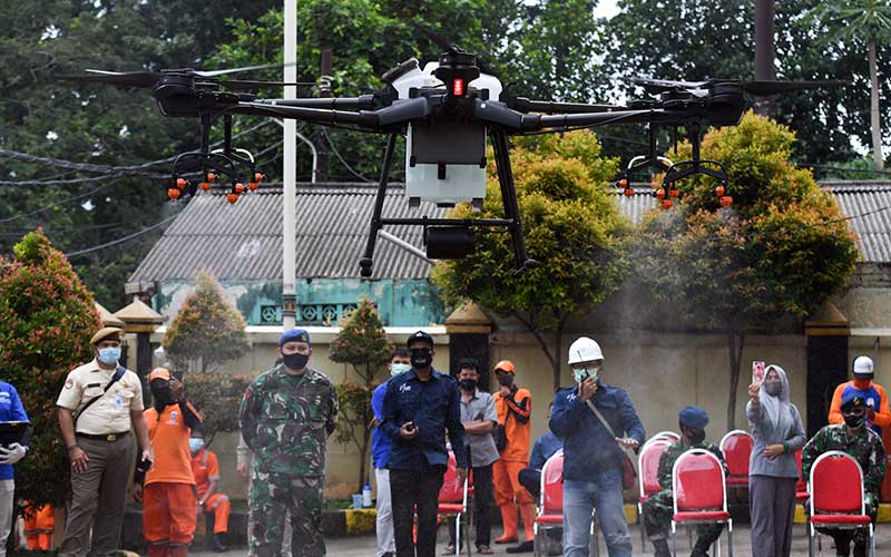  PENYEMPROTAN DISINFEKTAN DENGAN DRONE