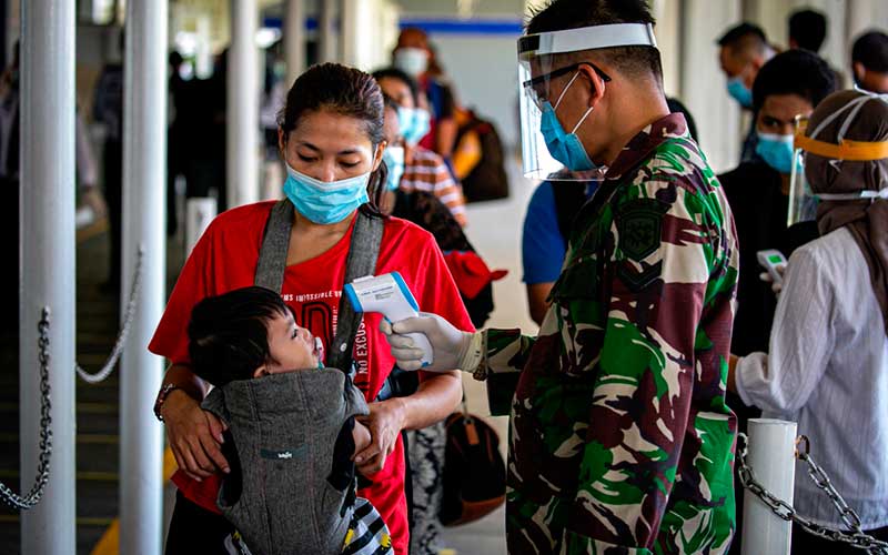  KEPULANGAN PEKERJA MIGRAN DARI MALAYSIA