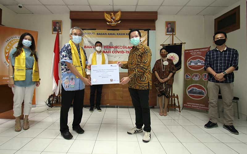  AXA MANDIRI DISTRIBUSIKAN DONASI