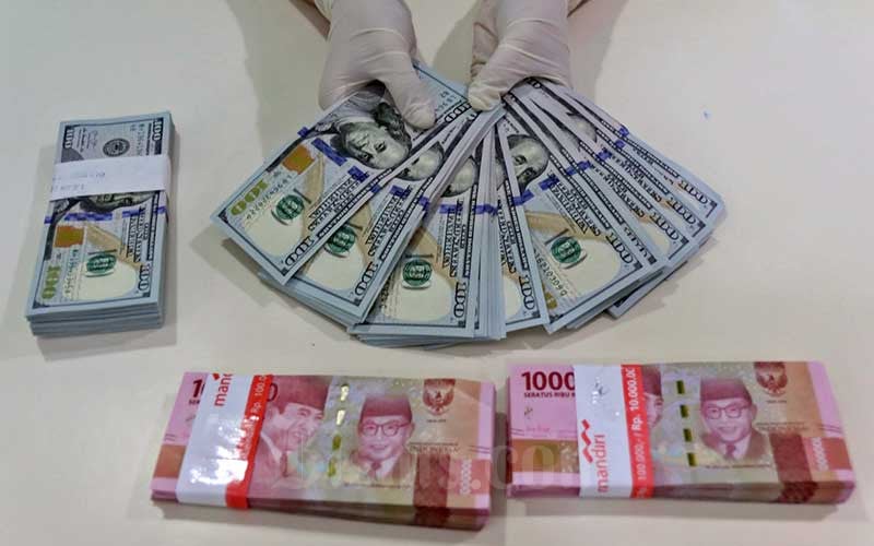  Kurs Jisdor Melemah ke Rp14.769, Rupiah Terdepresiasi di Pasar Spot