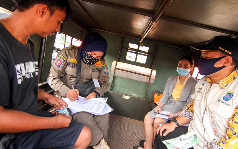  Warga Yang Tidak Memakai Masker di Depok Didenda Senilai Rp50 ribu hingga Rp250 ribu.