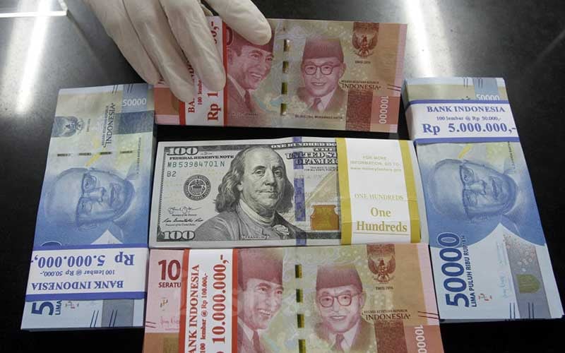  Kurs Jisdor Menguat ke Rp14.792, Rupiah Terdepresiasi di Pasar Spot