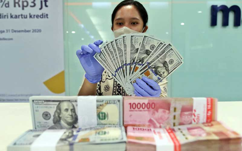  Dolar AS Rebound, Rupiah Berhasil Tetap Kokoh