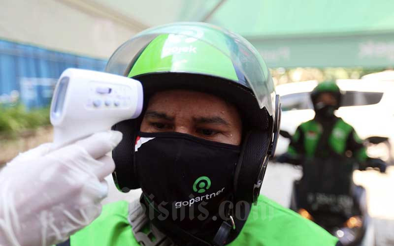  Gelar Aksi J3K, Gojek Bagikan Ribuan Masker Untuk Warga Depok