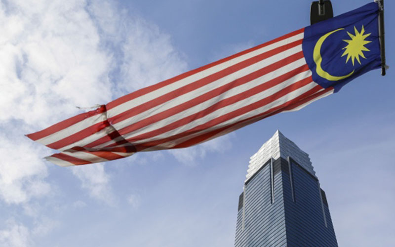 Bendera Malaysia di pusat bisnis Kuala Lumpur,/Bloomberg/Joshua Paul