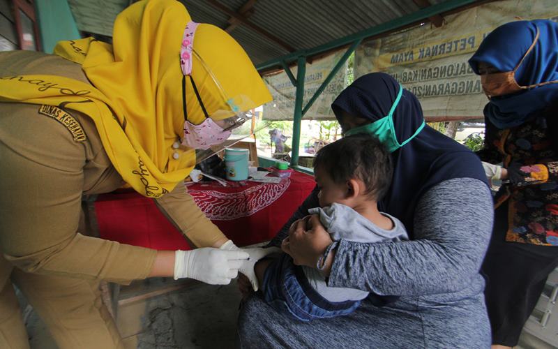  ADAPTASI KEBIASAAN BARU : Posyandu di Denpasar Gunakan Aplikasi