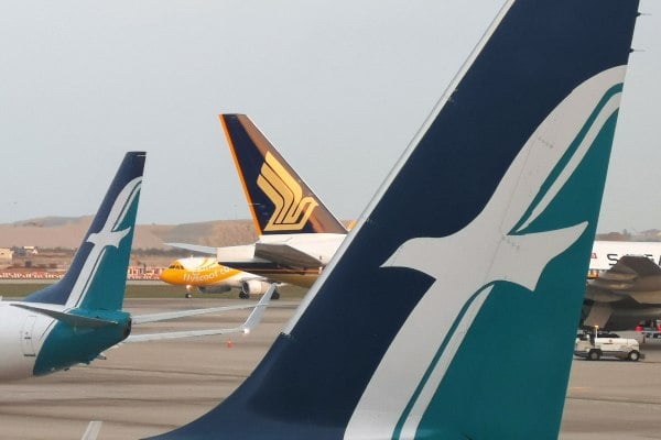 Pesawat milik maskapai Scoot, Singapore Airlines, dan Silk Air terlihat di Bandara Changi, Singapura, Selasa (14/8/2018)./Reuters-Edgar Su