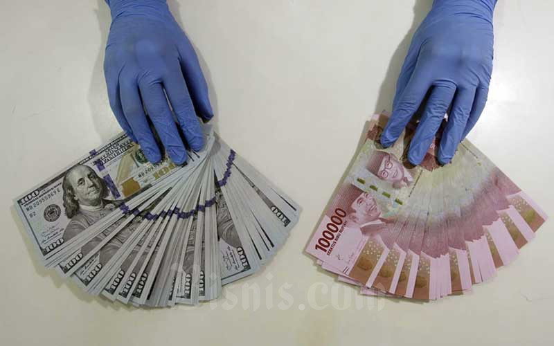  ​Tertekan Aksi Ambil Untung, Rupiah Lunglai di Awal Pekan