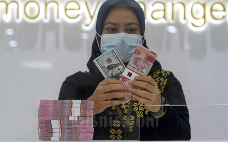  Bank Indonesia Pangkas Suku Bunga, Rupiah Melemah Ke Level Rp14.025 per Dolar AS
