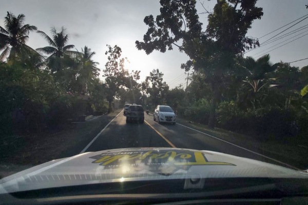 Ilustrasi - Kondisi lalu lintas di sepanjang Jalan Raya Denpasar--Gilimanuk, Bali, terpantau ramai lancar./Bisnis-Jelajah Jawa Bali 2019