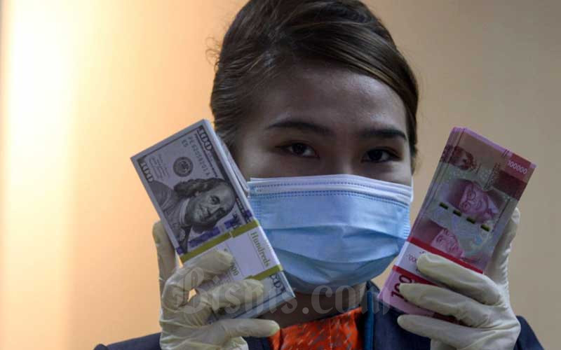  Rupiah Kembali ke 14.300-an, Terkuat Kedua di Asia