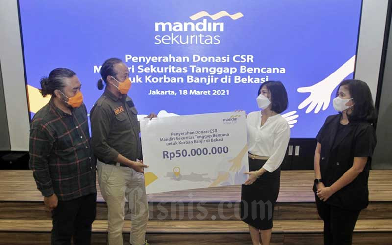  Mandiri Sekuritas Salurkan Donasi Kepada Korban Banjir di Bekasi