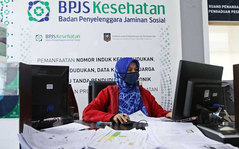 Karyawan beraktivitas di Kantor Badan Penyelenggara Jaminan Sosial (BPJS) Kesehatan, Jakarta, Rabu (13/5/2020). Bisnis/Eusebio Chrysnamurti